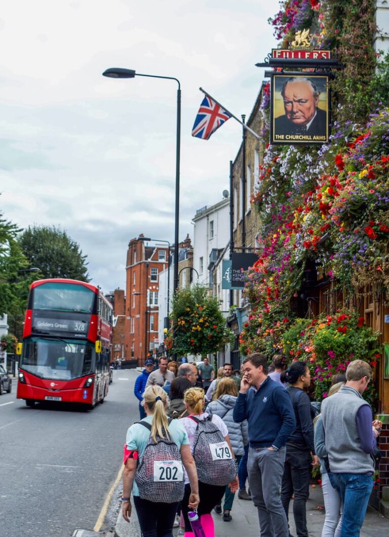 Crowd walking on street in London