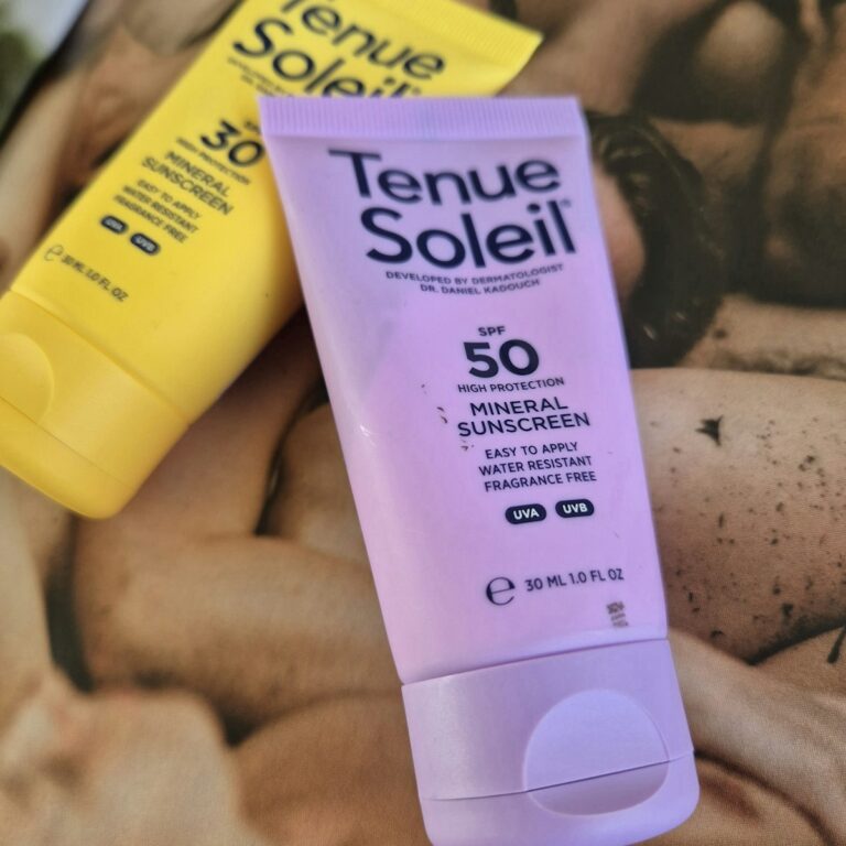 A close up of a sunscreen and a tube of lotion